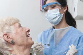 Dentist providing treatment